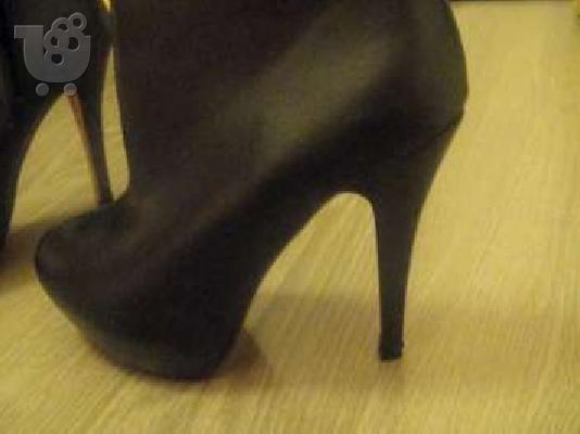 Red sole ankle boots