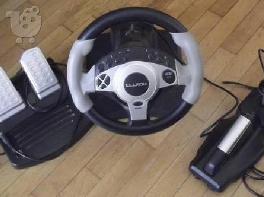 Sony Playstation 2 + 10 παιχνιδια  + τηλεχειριστηρια + τιμονιερα...