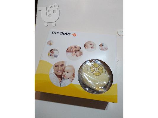 PoulaTo: Θηλαστρο medela swing