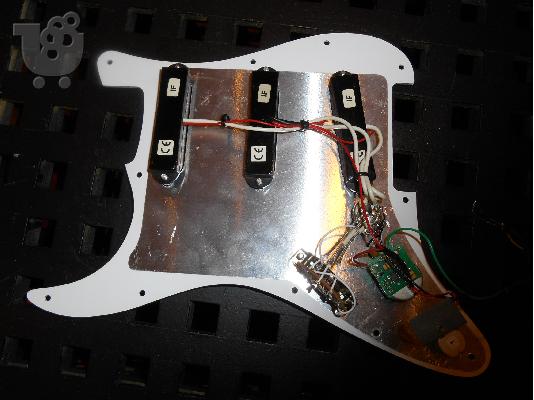 PoulaTo: Πωλειται fender pickguard με 3 Emg SA και SPC