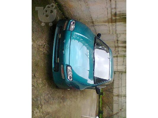 PoulaTo: MAZDA 323F '06